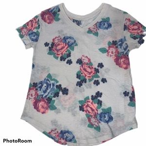 Girls Justice v-neck T-shirt with pink flowers.